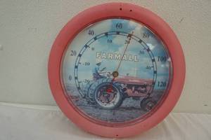 lot 152 image: Farmall thermometer