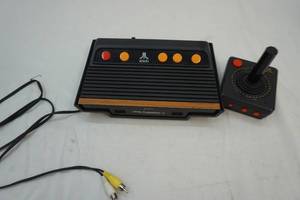 lot 153 image: Atari flashback 4 classic game console, joy stick
