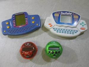 lot 26 image: (EC1) Handheld Games...