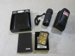 lot 34 image: (BSB) Zippo Lighter, Leather Tri-Fo...