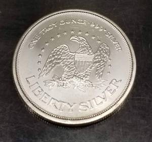 1 TROY OZ .999 FINE SILVER A-MARK ROUND