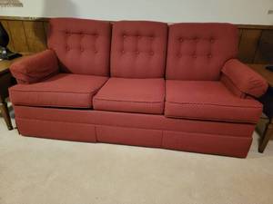 lot 62 image: Beautiful Cranberry Sleeper Couch- 68 x 31 x 22