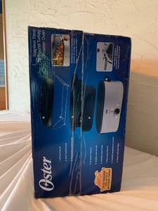 lot 11 image: Oster New In Box Stainless Steel Turkey Roaster