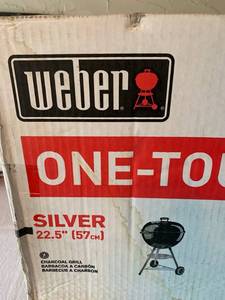 lot 13 image: New In Box Weber Charcoal Grill with bonus Cherrywood Charcoal