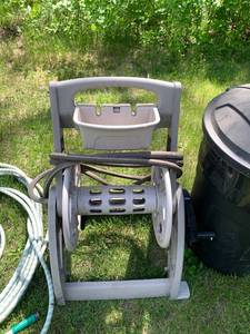 lot 108 image: ASSORTED YARD STUFF - CHAIR, HOSE, HOSE REEL, TRASH CAN