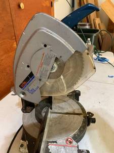 lot 148 image: RYOBI 10 INCH MITER SAW