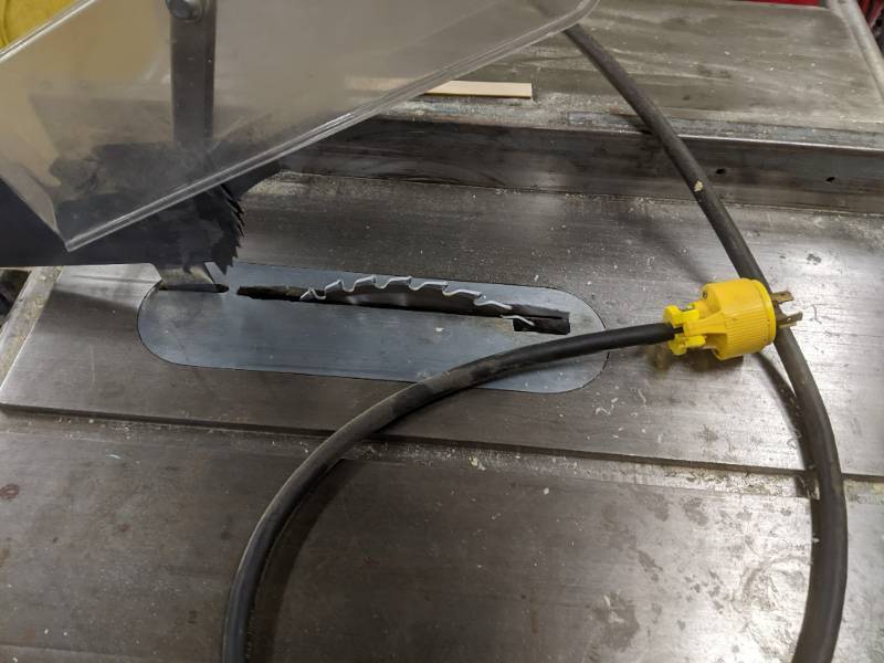 Table saw with easy off power contr...