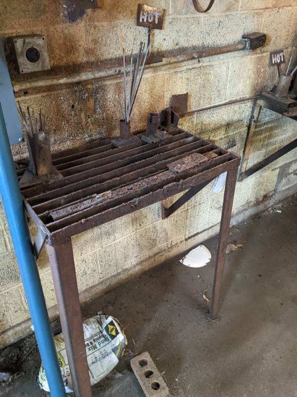 4 Welding stations and a park bench...