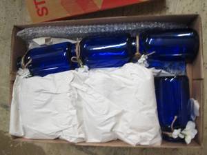 lot 102 image: box full of blue glassware...