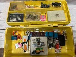 lot 22 image: BOX OF A FX SLOT CAR PARTS