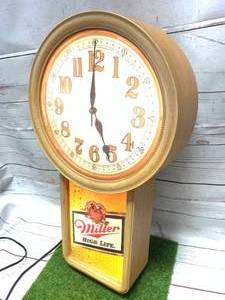 lot 46 image: VINTAGE MILLER HIGH LIFE LIGHTED CLOCK 21 INCH TALL