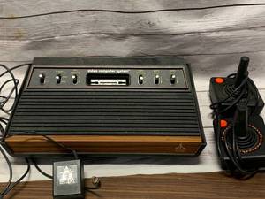 lot 52 image: ATARI 2600 GAMING CONSOLE