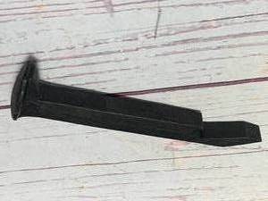 lot 64 image: METAL RAILROAD BOTTLE OPENER SPIKE 6 34