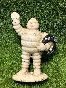 lot 65 image: CAST IRON MICHELIN MAN FIGURE 3 38