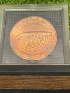 lot 81 image: ROLL OF UNOPENED & UNCIRCULATED 2009 Jefferson BUFFALO NICKELS AND TREASURY TOKEN