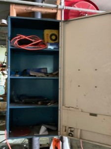 Three metal cabinets with contents included