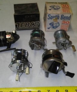 lot 567 image: Fishing Reels (5) plus 2 empty boxes