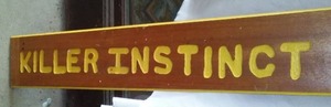 lot 600 image: Wood Sign Killer Instinct