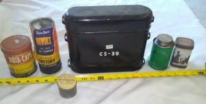 lot 697 image: Vintage Containers and Battery