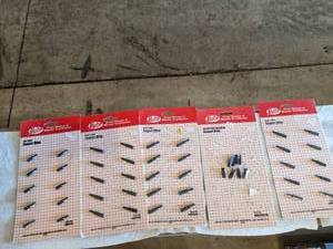 lot 245 image: 5 Malco bit sets. 4 new in pkg...