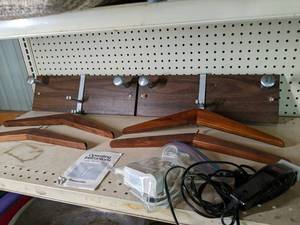 lot 253 image: 2 wall mount hangers with coat hang...