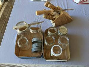 lot 215 image: Mason jars and knife block...
