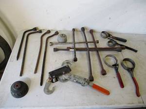 lot 14 image: Lot of Oil Wrenches and Tire Irons