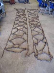 lot 55 image: Pair of Tractor Tire Chains. 24 wide x 144 long.