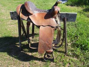 lot 63 image: Horseback Riding Leather Saddle with tooled leather. Tex Tum of Yoakum&nbspBarrel Rider.