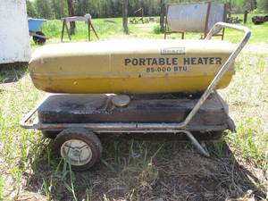 lot 73 image: Sears Portable Kerosene Heater.