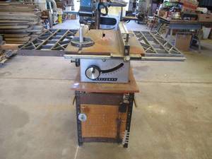 lot 82 image: Craftsman Table Saw on Stand. Without Motor.