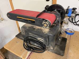lot 44 image: Craftsman 4 Inch Belt Sander 6 Inch Disc Sander With Stand