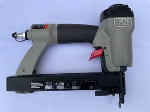 lot 56 image: Porter Cable Pneumatic Fastener Gun Model NS100A