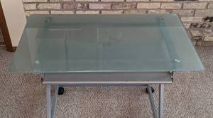 lot 24 image: Glass Topped Rolling Desk