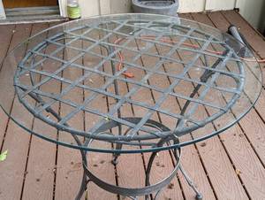 lot 99 image: Small Glass Topped Patio Table