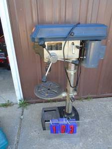 Ryobi bench top drill press. Good overall condition. Tested & works. No chuck key. As shown.