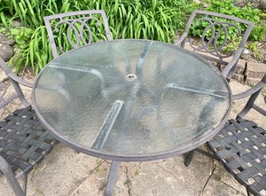 lot 12 image: Metal Glass Top Patio Table and 4 Chairs