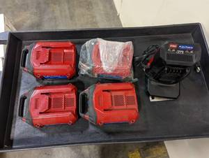 lot 864 image: Lot of 4 Toro Flex-Force 60V Batteries with Charger