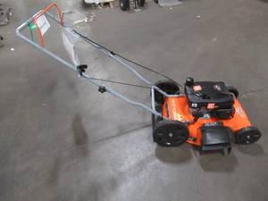 lot 953 image: Yardmax 21 in. 170cc OHV Walk Behind Gas Push Mower 2-in-1 Mulch Plus Side Discharge YG1550, Starts and Runs, Leaks Oil.
