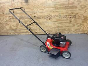 lot 24 image: YARD MACHINES 20 in. 125 cc OHV Briggs and Stratton Gas Walk Behind Push Mower