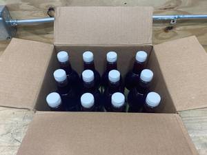 lot 128 image: SNO-KONE Case of- Strawberry Snow Cone Syrup- 25oz (12 Bottles)
