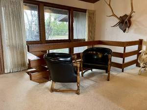 lot 4 image: Matching Pair of Vintage Naugahyde Black Barrel Chairs