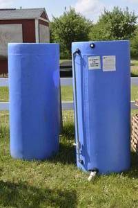 lot 2 image: Rotonics 150-Gallon Plastic Storage Tanks