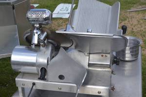 lot 64 image: Globe Commercial Meat Slicer Model #500 with sharpener