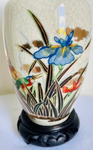 Asian Inspired Vase with a Wooden Stand