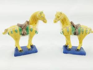 lot 54 image: Pair of Ceramic Yellow Horses