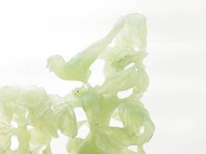 lot 56 image: Large Serpentine Carved Bird with Leaves