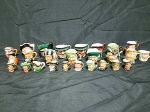 lot 183 image: Group of 26 Royal Doulton, Sandland, and Staffordshire Miniature Toby Jugs