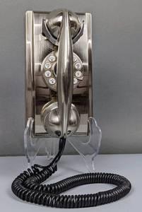 lot 28 image: Retro Style Brushed Chrome Crosley Classic Wall Phone