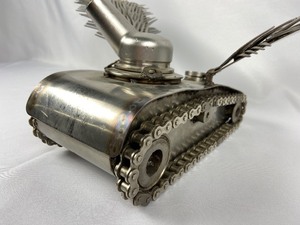 lot 68 image: Fabulous Metal Art - Winged Tank with Forks and Chains